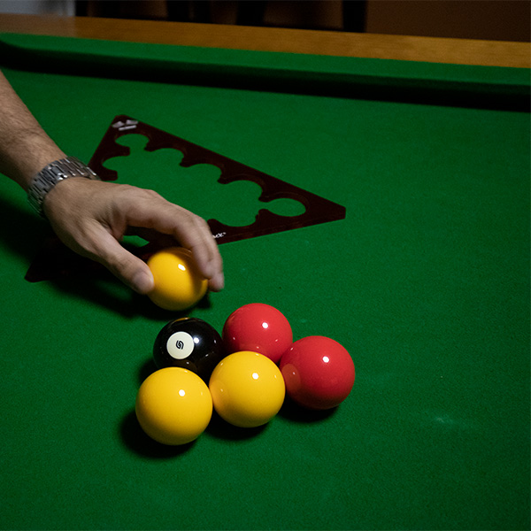 Hand racking pool balls pattern